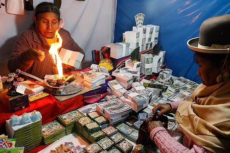 One old lady sells symbolic money to another old lady, but for the real money. Market of the dreams is funny.